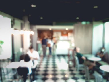 Kahve Cafe müşteriler arka plan vintage tonu renk stili ile bulanıklık.