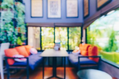 Bulanık kahve ve müşterilerin arka plan vintage ton renk tarzına sahip dinlendirici kafe.