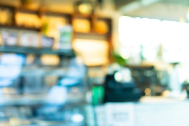 Bulanık kahve ve müşterilerin arka plan vintage ton renk tarzına sahip dinlendirici kafe.