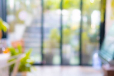 Bulanık kahve ve müşterilerin arka plan vintage ton renk tarzına sahip dinlendirici kafe.