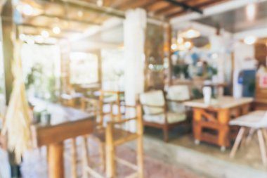 Bulanık kahve ve müşterilerin arka plan vintage ton renk tarzına sahip dinlendirici kafe.