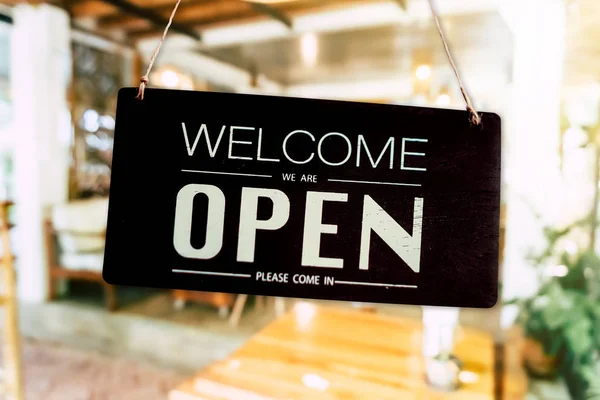 Welcome open sign use for any business in front of shop or online background.