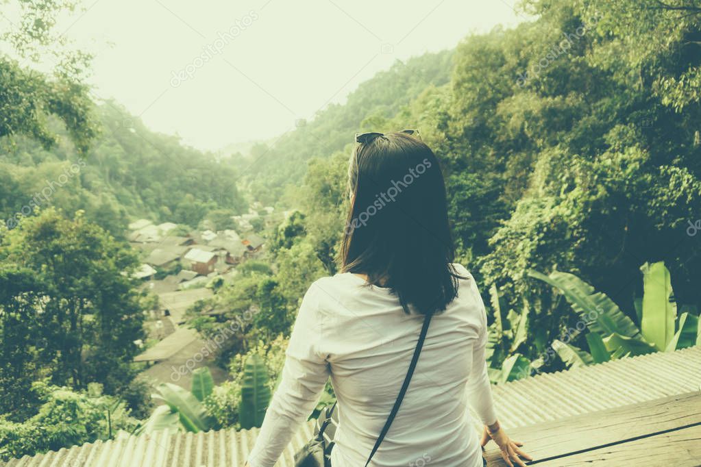 Woman chill and sit sightseeing nature enviroment  freedom concept. relaxation on vacation day 