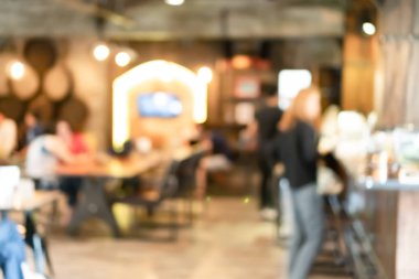 Kahve Cafe müşteriler arka plan vintage tonu renk stili ile bulanıklık.