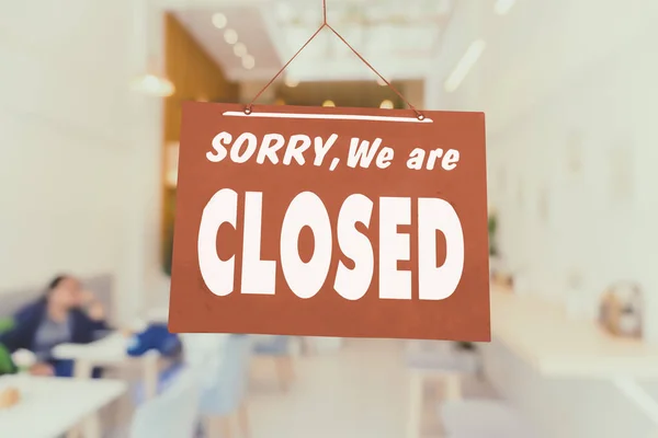 Sorry we are closed sign hang on door of business shop. — Stock Photo, Image