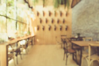 Kahve Cafe müşteriler arka plan vintage tonu renk stili ile bulanıklık.