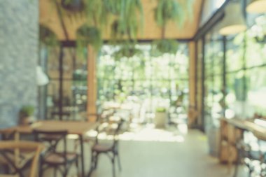Kahve Cafe müşteriler arka plan vintage tonu renk stili ile bulanıklık.