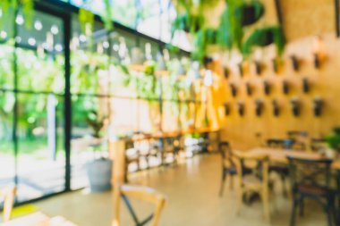 Kahve Cafe müşteriler arka plan vintage tonu renk stili ile bulanıklık.