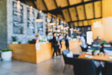 Kahve Cafe müşteriler arka plan vintage tonu renk stili ile bulanıklık.