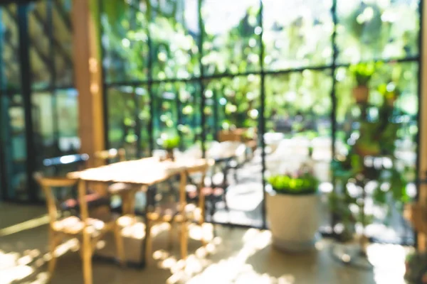 Kahve Cafe müşteriler arka plan vintage tonu renk stili ile bulanıklık.