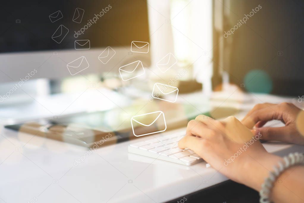 Woman hand using smartphone to send and recieve email for business.