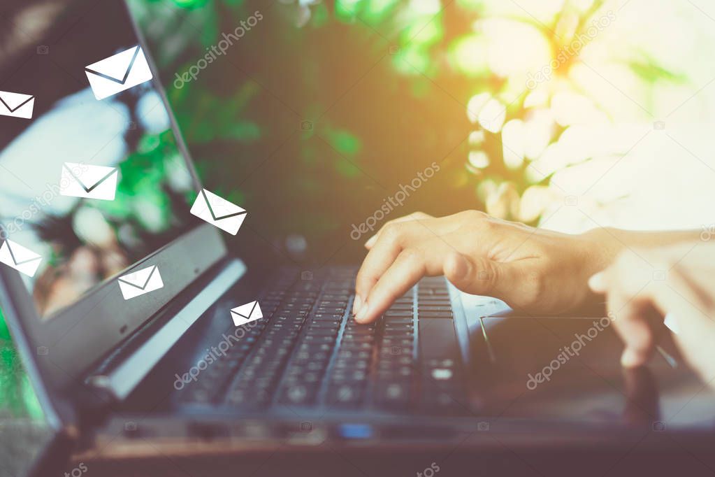 Woman hand using smartphone to send and recieve email for business.