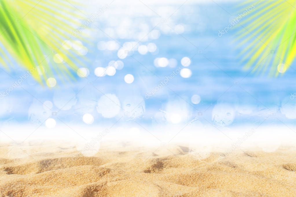 Tropical nature clean beach and white sand in summer with sun light blue sky and bokeh background.