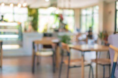 Kahve Cafe müşteriler arka plan vintage tonu renk stili ile bulanıklık.