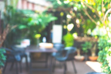 Kahve Cafe müşteriler arka plan vintage tonu renk stili ile bulanıklık.