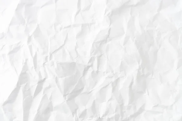 白色折皱纸纹理背景的顶视图 — 图库照片