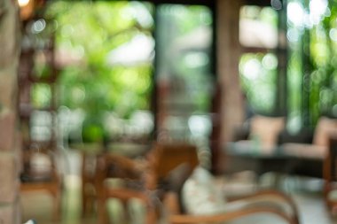 Bulanık kahve ve müşterilerin arka plan vintage ton renk tarzına sahip dinlendirici kafe.