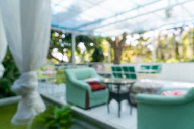 Bulanık kahve ve müşterilerin arka plan vintage ton renk tarzına sahip dinlendirici kafe.