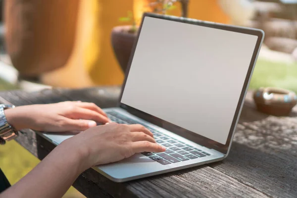 People using laptop to work study on work desk. Business, financial, trade stock maket and social network concept.