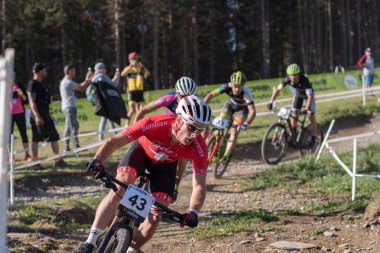 VALLNORD, ANDORRA  - JULY 18 : CYCLIST in the MERCEDES-BENZ UCI MTB WORLD CUP MASTERS 2018 - XCO - XCC - DHI Vallnord, Andorra on July 18, 2018 in Vallnord, Andorra Credit: Martin Silva Cosentino / Alamy Live News clipart