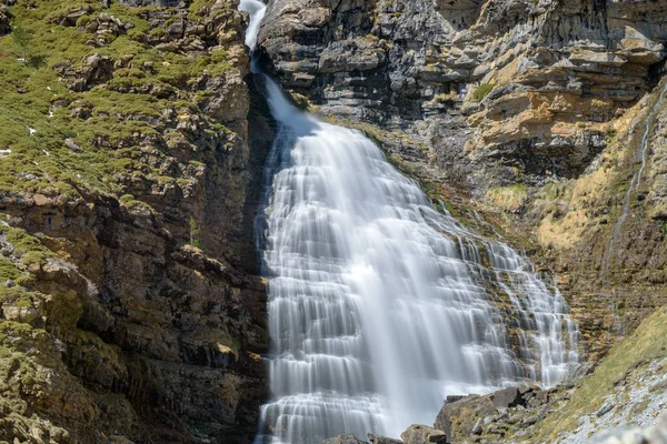 The Horse Tail waterfalls at Ordesa National Park. Pyrenees. Hue
