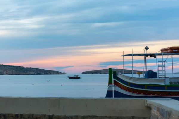 The panorama of harbour on St Paul\'s Bay with fishing boats and tourist ships, Bugibba, Malta