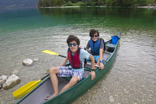 Happy Boy Doing Canoe Lake Bohinj Royalty Free Stock Images