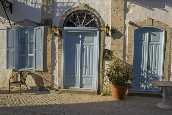 colorful and stone houses in narrow street in Alacati cesme, izmir