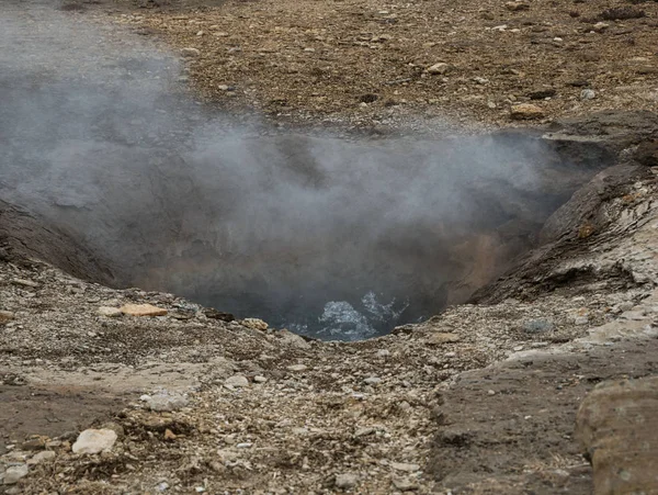 Water vapour over a small geothermal source — Stock Photo, Image