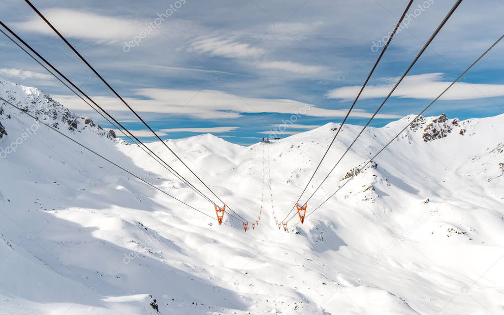 ski lift in arosa switzerland blue sky winter