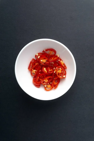 Red Chili Slices Dark Background Selective Focus Crop Fragment — Stock Photo, Image