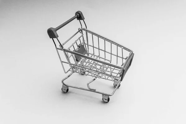 Carrito Compras Sobre Fondo Blanco Negro Concepto Negocio Compras Enfoque —  Fotos de Stock