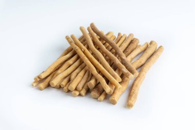 Doğal seçici odak ve kırpma parçası beyaz zemin üzerine Misvak (Kayu Sugi) diş fırçası. Bu bir diş dal Salvadora persica ağaçtan yapılan temizlik ve aynı zamanda miswaak, siwak, Sugi veya sewak biliyorum