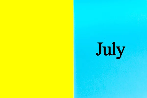 Юлі Писав Слова Синьо Жовтому Тлі Концепція Календаря Місяця Дати — стокове фото