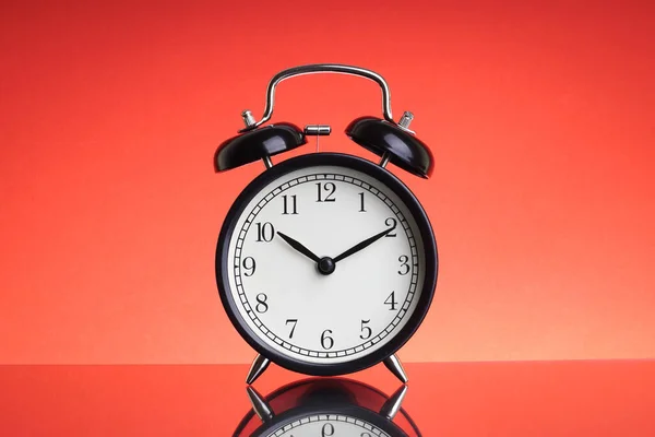 Alarm Clock Red Background Selective Focus Crop Fragment Business Copy — Stock Photo, Image