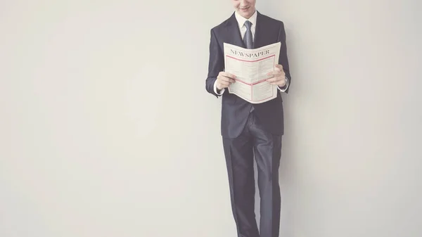 Businessman Reading Newspaper Gray Background — Stock Photo, Image