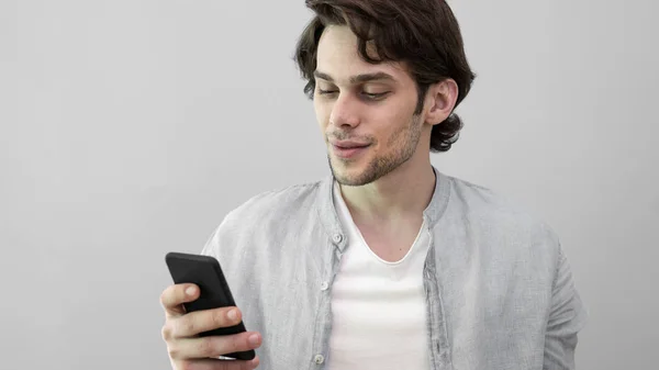 Young Man Using Mobile Phone — Stock Photo, Image