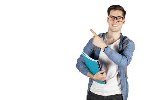 Young man showing direction and pointing up on isolated background