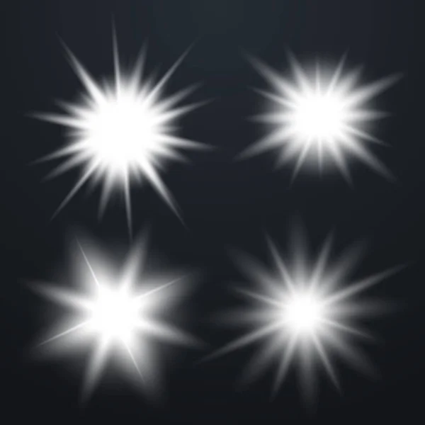 Set of Glowing Light Stars — Stock Vector