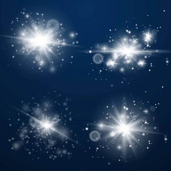 Uppsättning av glödande ljus stjärnor med gnistrar. — Stock vektor