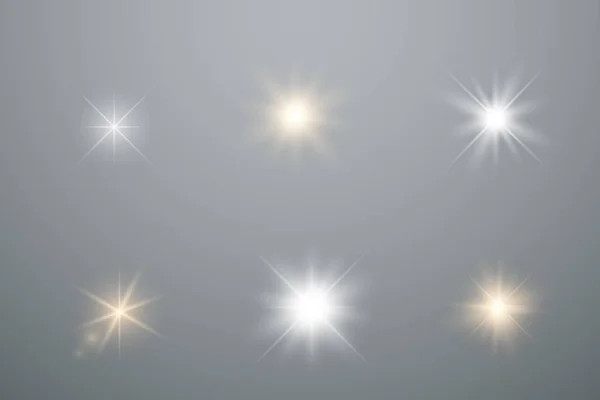 Conjunto de estrellas de luz brillante — Vector de stock