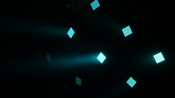 Lights in night club. Spotlight, head, scanners. Lighting equipment. Blue lights in dark stage from scenic spotlights. Modern lighting equipment. Stage equipmet. — Stock Video