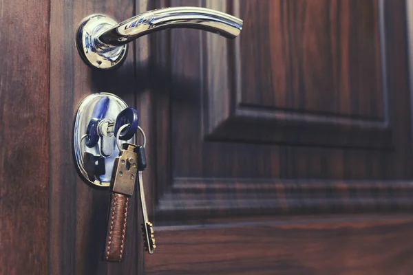 Key with key fob in the door lock