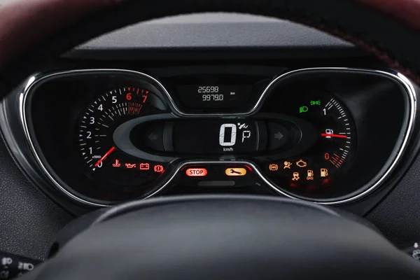 modern car dashboard with luminous lights. closeup view