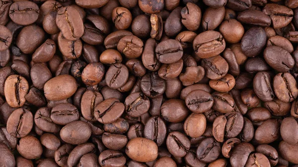 Texture of coffee beans. You can apply for coffee wallpaper coffee with text and everything about coffee background concept.