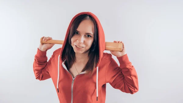 Young cute girl with baseball bat, Girl with a bat. girl or criminal woman, holding baseball bat in hand.  Sport and training