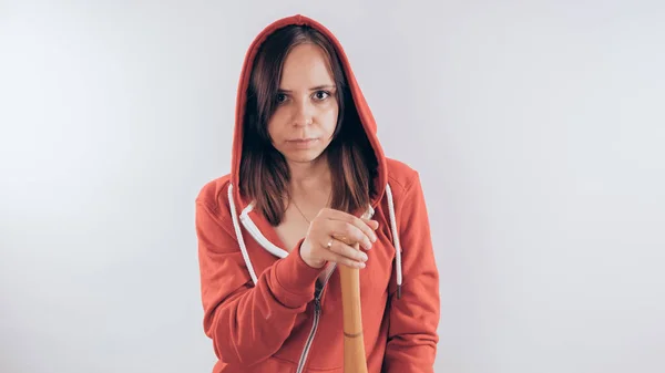 Young cute girl with baseball bat, Girl with a bat. girl or criminal woman, holding baseball bat in hand.  Sport and training