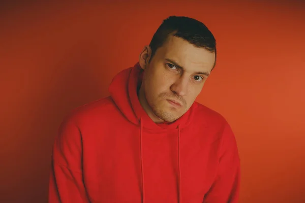 Crazy Charismatic Guy Posing Orange Background Man Red Tracksuit — Stock Photo, Image