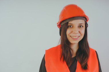 Kız inşaat işçisi, yol işçi veya polislerle dok işçisi benim, bir kadın bir kask ve turuncu yelek