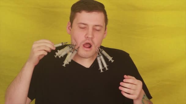 Man Syringes His Cheeks — Stock Video